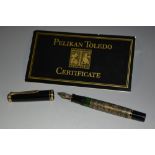 A Pelikan Toledo M900 fountain pen, two-tone 20ct gold nib, the barrel's mounts stamped 925,