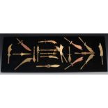 Trench Art - an arrangement of brass paper knives, flatware and other utensils,