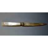 An Edwardian silver letter knife, the pointed blade engraved to the tip with scrolling foliage,