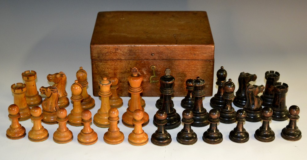 A boxwood and ebonised tournament size weighted Staunton pattern chess set, probably Jaques,