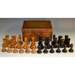 A boxwood and ebonised tournament size weighted Staunton pattern chess set, probably Jaques,