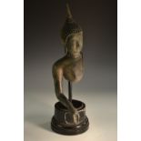 After the Antique, a verdigris patinated bronze Buddha fragment, Chinese/Thai, 40cm long,