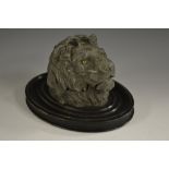 A late 19th century spelter novelty inkwell, cast as a lion's head, hinged cover,