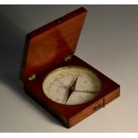 A late 19th century mahogany travelling pocket compass, hinged cover enclosing a 6cm dial,