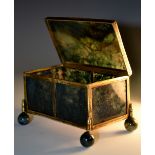A Victorian gilt metal mounted moss agate casket, hinged cover, ball feet, 9cm wide, c.