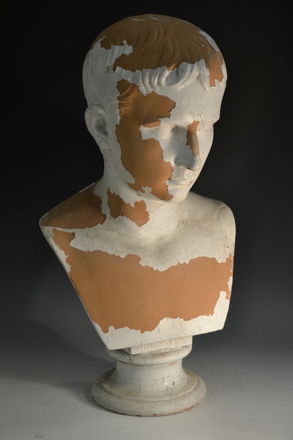 A 19th century terracotta portrait bust, of Augustus, waisted socle, 52cm high, c.