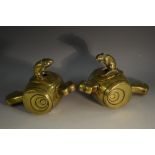 A pair of Chinese bronze censors and covers, each cast as a rat surmounting a barrel,