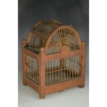 A linnet cage, domed cresting, turned finials to angles, hinged base, 20cm high, 15.