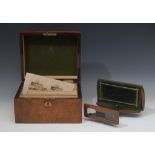 A Victorian walnut patent stereoscopic viewer and cards, The Stereoscopic Treasury,