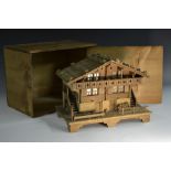 A Black Forest novelty box, as a chalet, hinged cover, 26cm wide, c.
