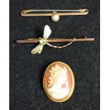 A 9ct gold peridot dragonfly brooch, stamped 9ct; a 9ct gold pearl mounted bar brooch,