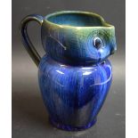 A Bourne Denby Danesby electric blue owl jug, loop handle, 15cm high,