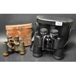 A pair of military stereo binoculars in leather case;