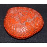A19th century Chinese 19th century peach shaped cinnabar lacquer box and cover,