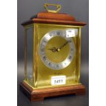 A 20th century mahogany and lacquered brass mantel clock, 10.