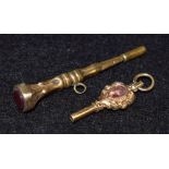 A Victorian gold stone set pocket watch key;