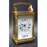 A French lacquered brass carriage timepiece, 5.