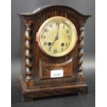Oak cased striking mantel clock, c.