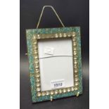 A Victorian turquoise inlaid and paste set photograph frame