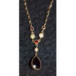 A garnet and seed pearl pendant necklace, 9ct gold mount and chain, 2,