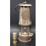 An Eccles type 6 miners safety lamp;