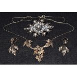 A late 19th/ early 20th century old cut diamond parure, comprising a floral swags necklace,