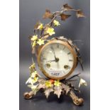 An Albany china floral mounted clock
