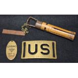 A billiards cue tip file; a US Army brass buckle;