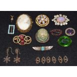 A collection of Victorian brooches; etc.