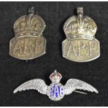 Two hallmarked silver ARP badges;