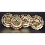 A set of four Royal Crown Derby Christmas plate,