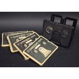 A tin plate camerascope, with sets of twelve camerascopic views and prints of New York,