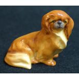 A Royal Worcester animal model, of a Pekingnese dog, printed crown and circle mark in black,