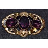 A large Victorian amethyst set brooch