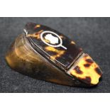 A 19th century horn and tortoiseshell snuff box with silver inlay