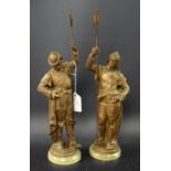 A pair of spelter figures, guardsmen with pike spears,