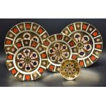 A pair of Royal Crown Derby 1128 pattern dinner plates, a pair of dessert plates, a five petal dish,