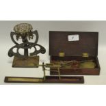 A set of Postage scales; a mahogany cased set of Apothecary scales;