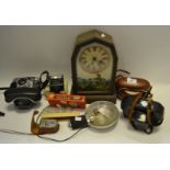 An American style mantel clock; an Halina camera,