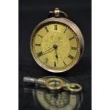 A lady's 9ct gold open face fob watch, gilt floral dial, Roman numerals, minute track,