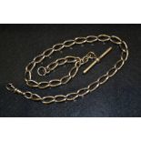 A 9ct gold twisting link Albert chain and T-bar terminal, 35cm long, 34.