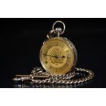 A 12ct gold open face pocket watch, gilt floral dial, raised Roman numerals, minute track,