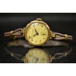 A Thomas Russell & Son lady's 9ct gold cased Premier wristwatch, gilt dial, Arabic numerals,