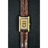 Brooks and Bentley - a solid pure 9999 gold ingot dress watch, rectangular arched case,