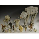An original 1981 Star Wars AT AT Walker by Kenner; a 1982 AT ST Scout Walker;