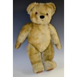 A Chad Valley jointed mohair bear, small ears, horizontal stitched snout, wrexine pads, 58cm high,