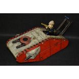 A German tinplate clockwork model of a British tank, pop-up rifleman,