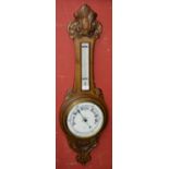 A Victorian oak barometer,