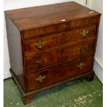 A George III oak chest, oversailing top, three cockbeaded graduated drawers,