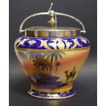 A Noritake hand painted biscuit barrel, painted with camel rider and desert tent scene,